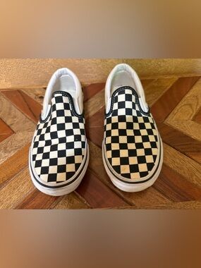 Vans Black and White Checkerboard Slip Ons